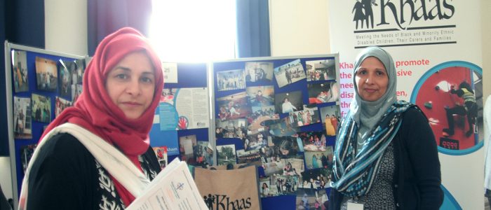 Frida and Saiqa with Khaas information stand